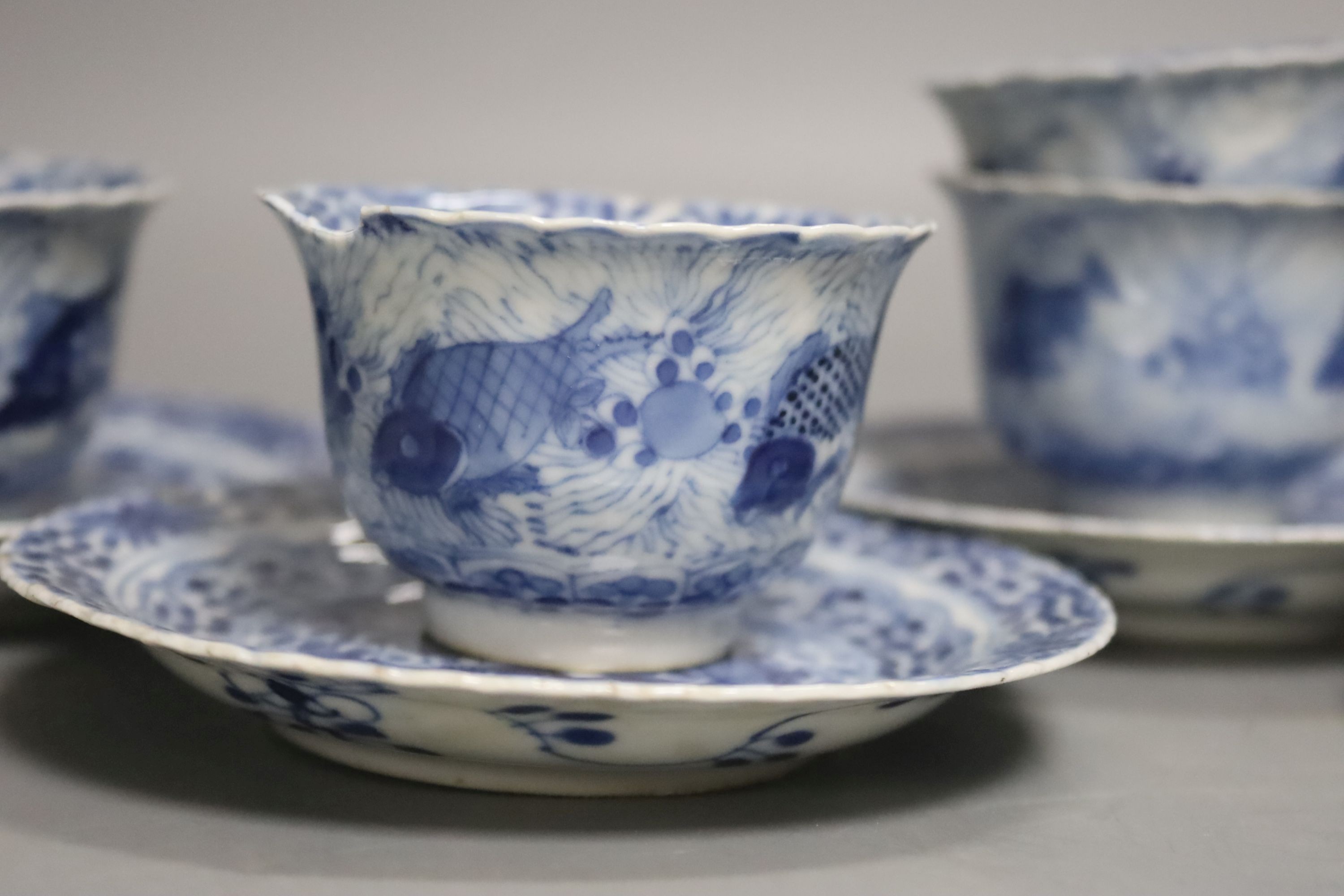 Five 19th century Chinese blue and white tea bowls and saucers, four-character marks to bases